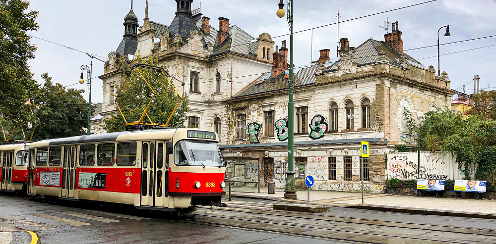 Red tram in the Czech Republic by Alex Wolowiecki