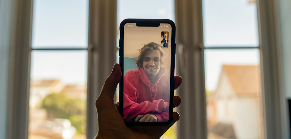 View of a phone during a video call by Ben Collins