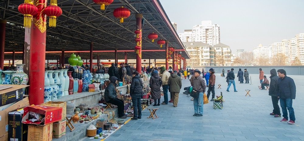 Shopping at a Beijing market by Serg Balak