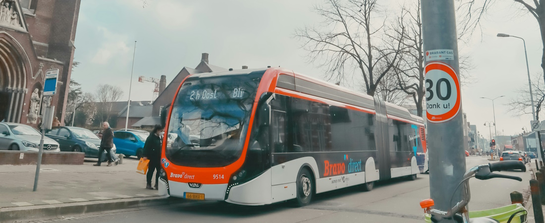 Bravo Bus in Eindhoven and Cyclist in Eindhoven by Tayla Kohler