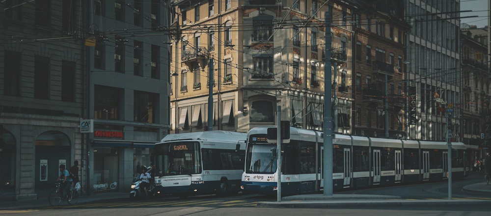 Bike, Scooter, Bus and Tram in Geneva by Egor Myznik on Unsplash