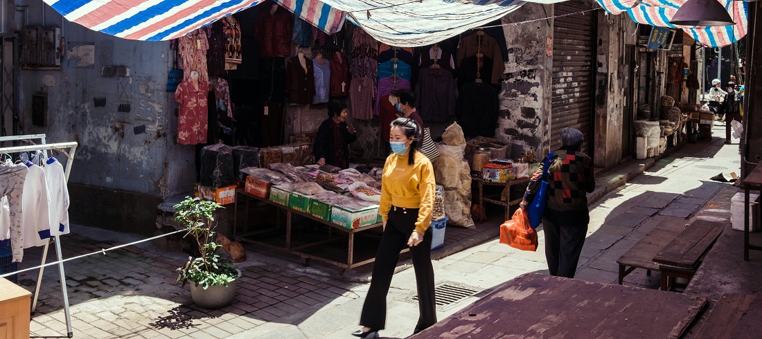 Shopping at a street market in Guangzhou by Max Zhang