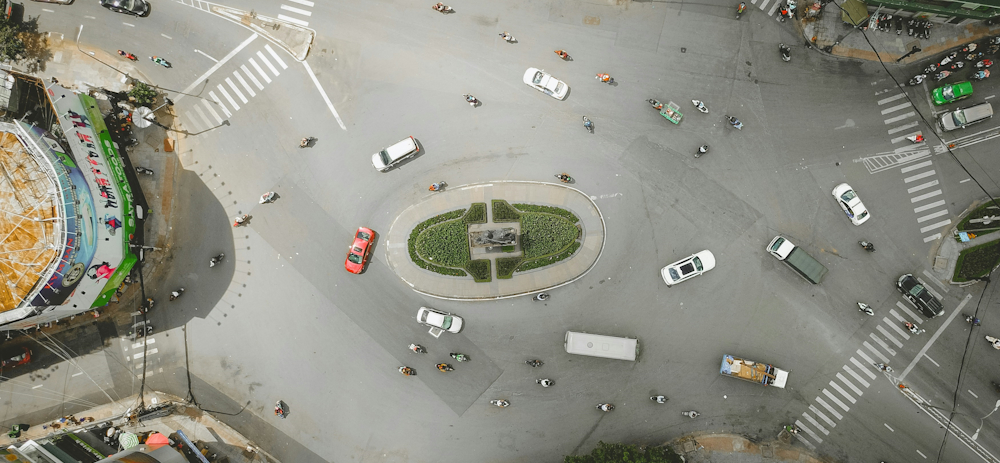 Bird's Eye View of Ho Chi Minh City Traffic Intersection by Tony Pham on Unsplash