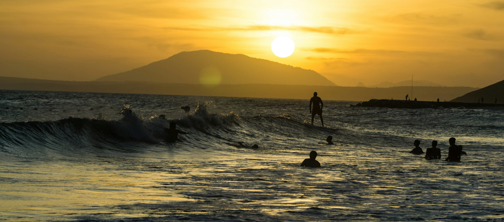Surfing in Mui Ne by Guille Álvarez on Unsplash