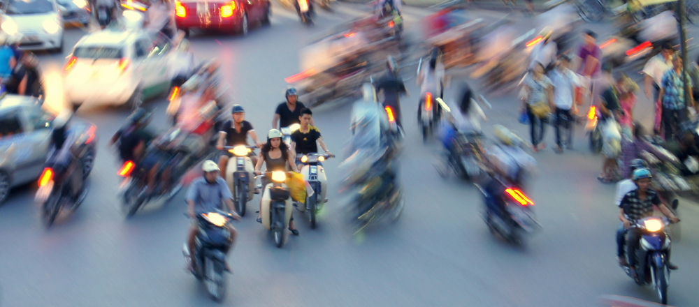 Hanoi Traffic Milieu by Ian Travelsnips on Unsplash