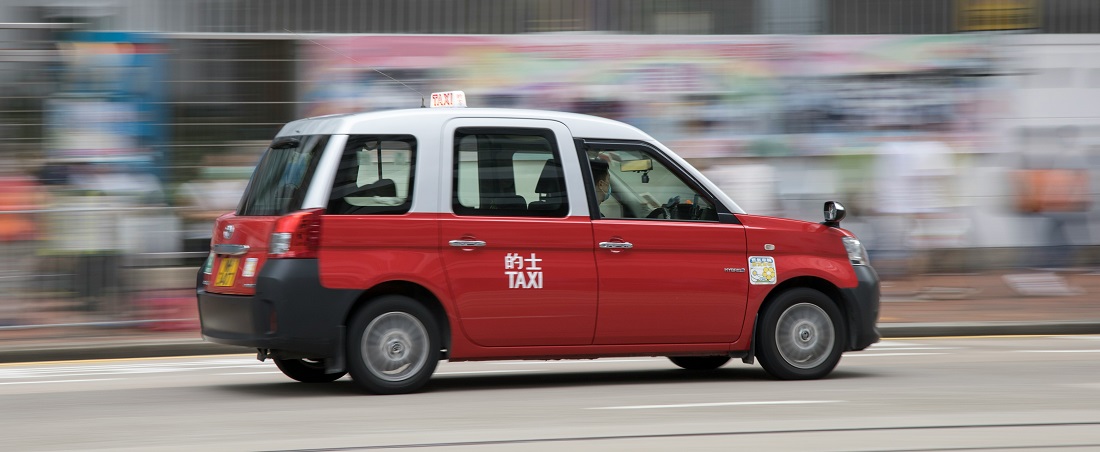Driving a Hong Kong taxi by Arron Choi