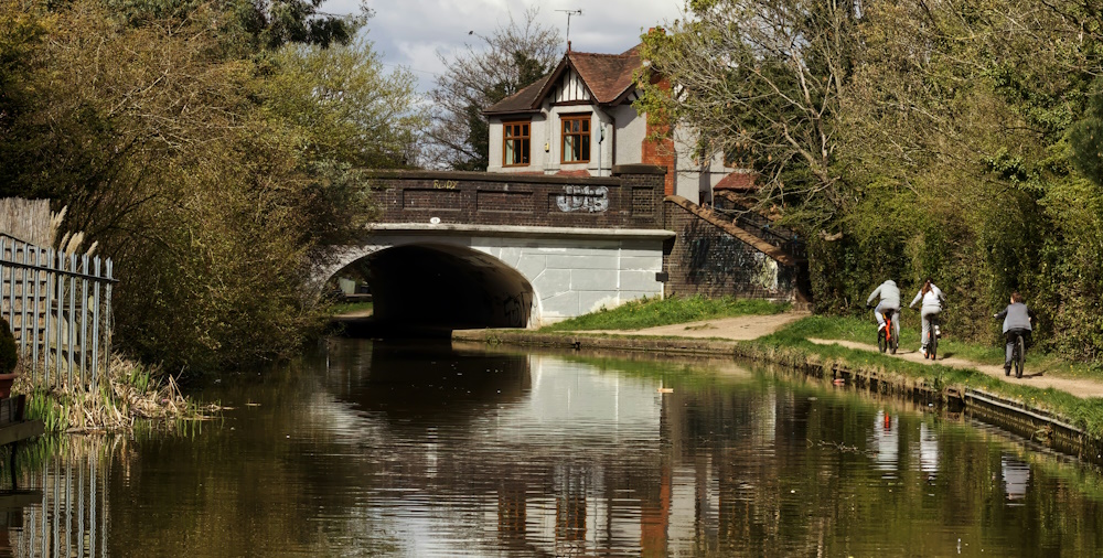 Cyclists on Coventry Canal by Adam Mills