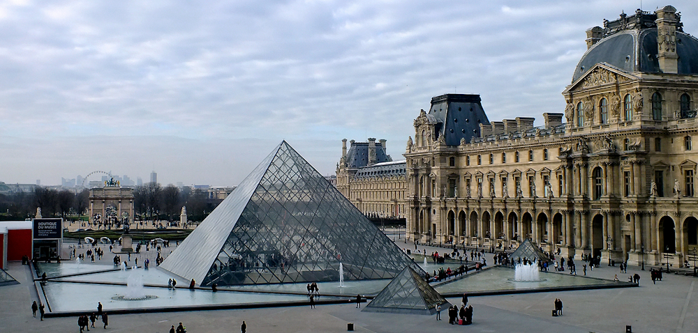 Louvre Pyramid in Paris by Irina Lediaeva on Unsplash