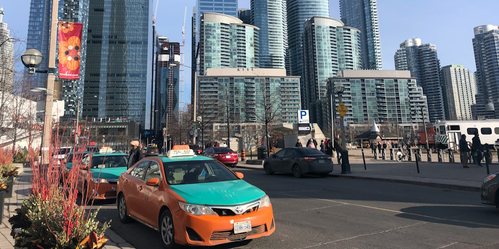 Taxi Cabs in Downtown Toronto by Sanika Kumar