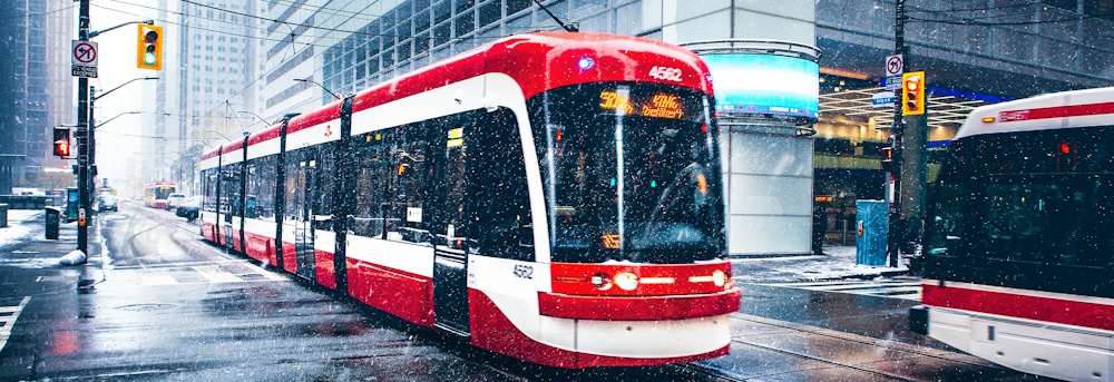 Toronto Streetcar in Dundas Square, Toronto by Marcin Skalij