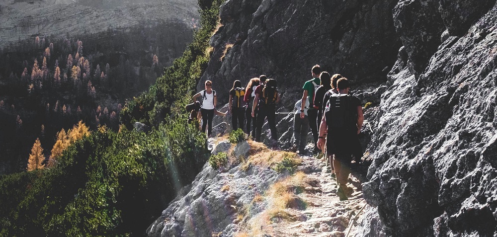 Group hiking in the mountains by Antonio Molinari