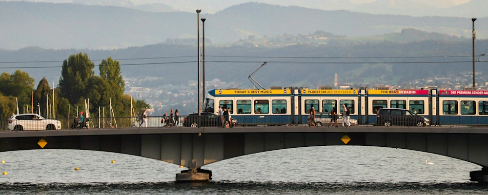 Tram Crossing a Bridge in Zurich by Livia Widjaja on Unsplash