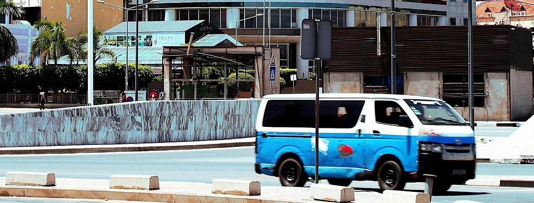 Minivan taxi in Angola by Jonathan Quiúma