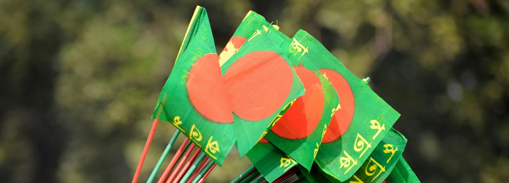 Close up photo of the Bangladesh flag by Moshiur Rahman Bijoy