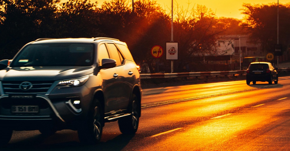 Cars driving down a road in Gaborone by The Snapper from Pexels