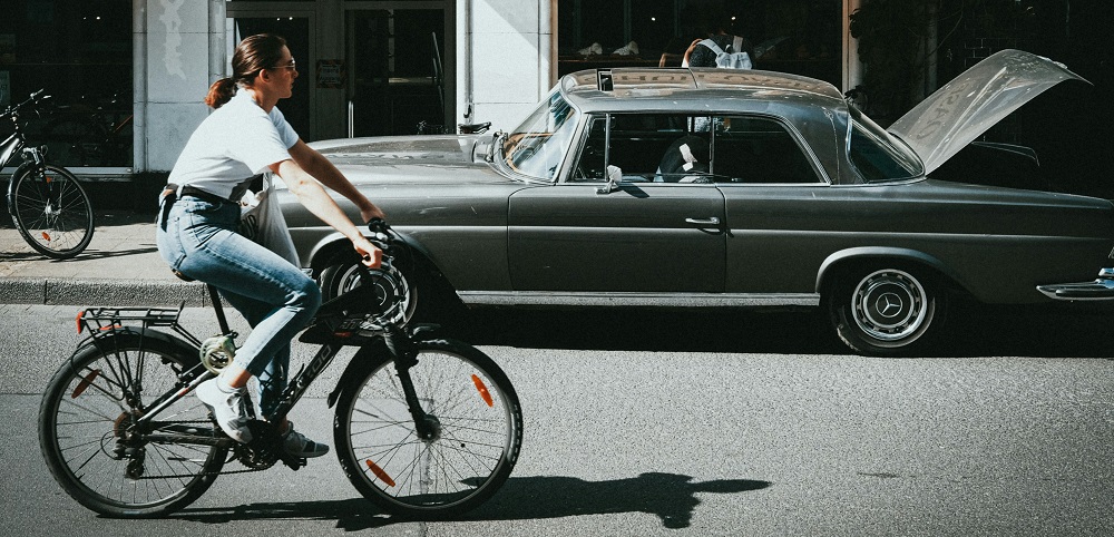 Woman cycling in Germany by Bennet Tobias