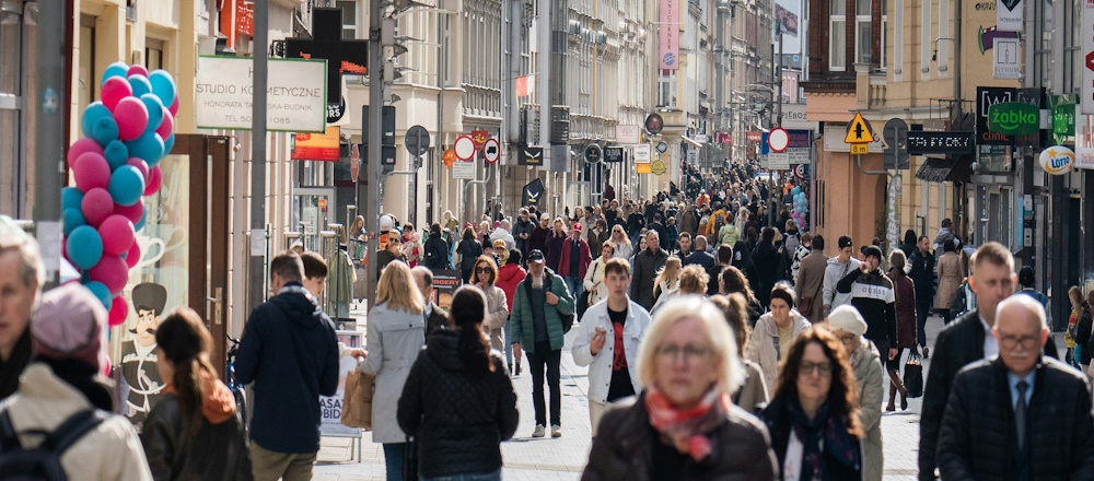 Crowded Street in Poznań, Poland, by Jakub Żerdzicki on Unsplash