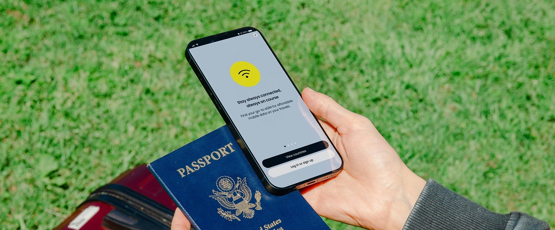 Man holding phone with WiFi by Jacob from Pexels