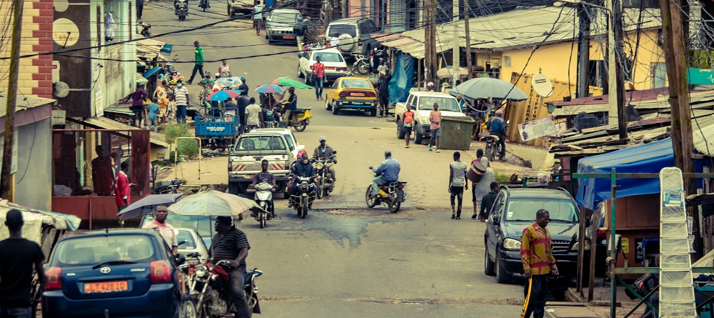 Busy African street by Edouard Tamba