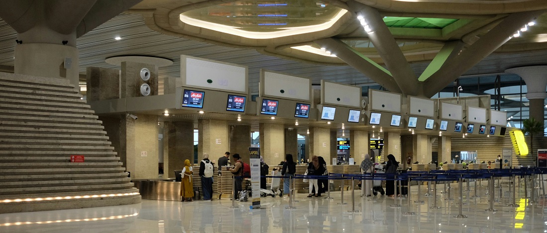 People in airport lines by Rudityas W Anggoro