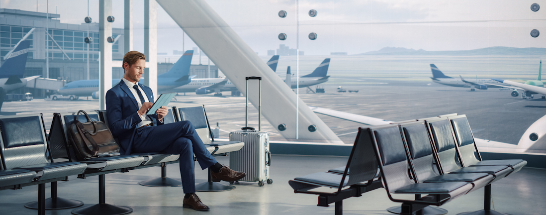 Businessman sitting in an airport terminal