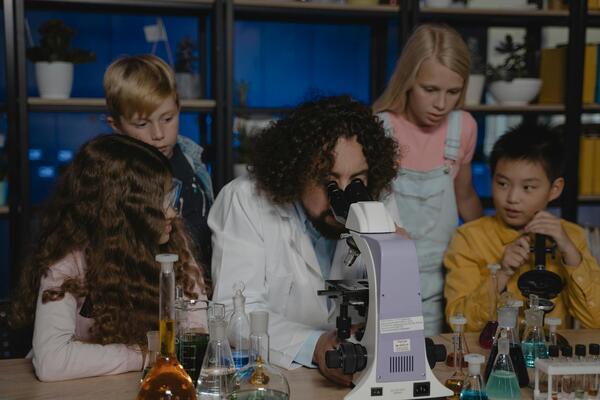 Teacher doing science experiment with students by Tima Miroschnichenko from Pexels