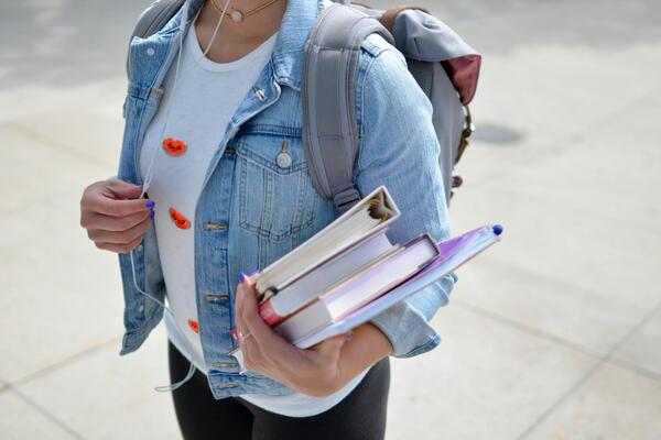 Schoolgirl holding books